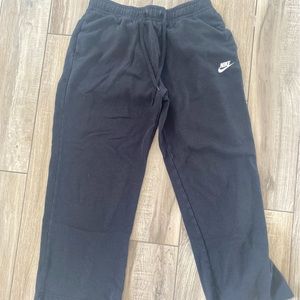 These are black women’s wide leg sweatpants in a size medium
